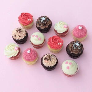 Mini Valentine's Day cupcakes - assorted mixture of flavours and designs all themed for Valentine's Day